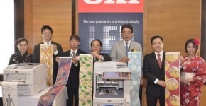 Representatives from OKI Data (from left, Nobuyasu Suzuki, Yoshihide Nakata,Takashi Inoue, Masahiko Morioka and Goh Yin Hwang) showcasing the A4 mono and colour long banners printed by the newly launched printers.